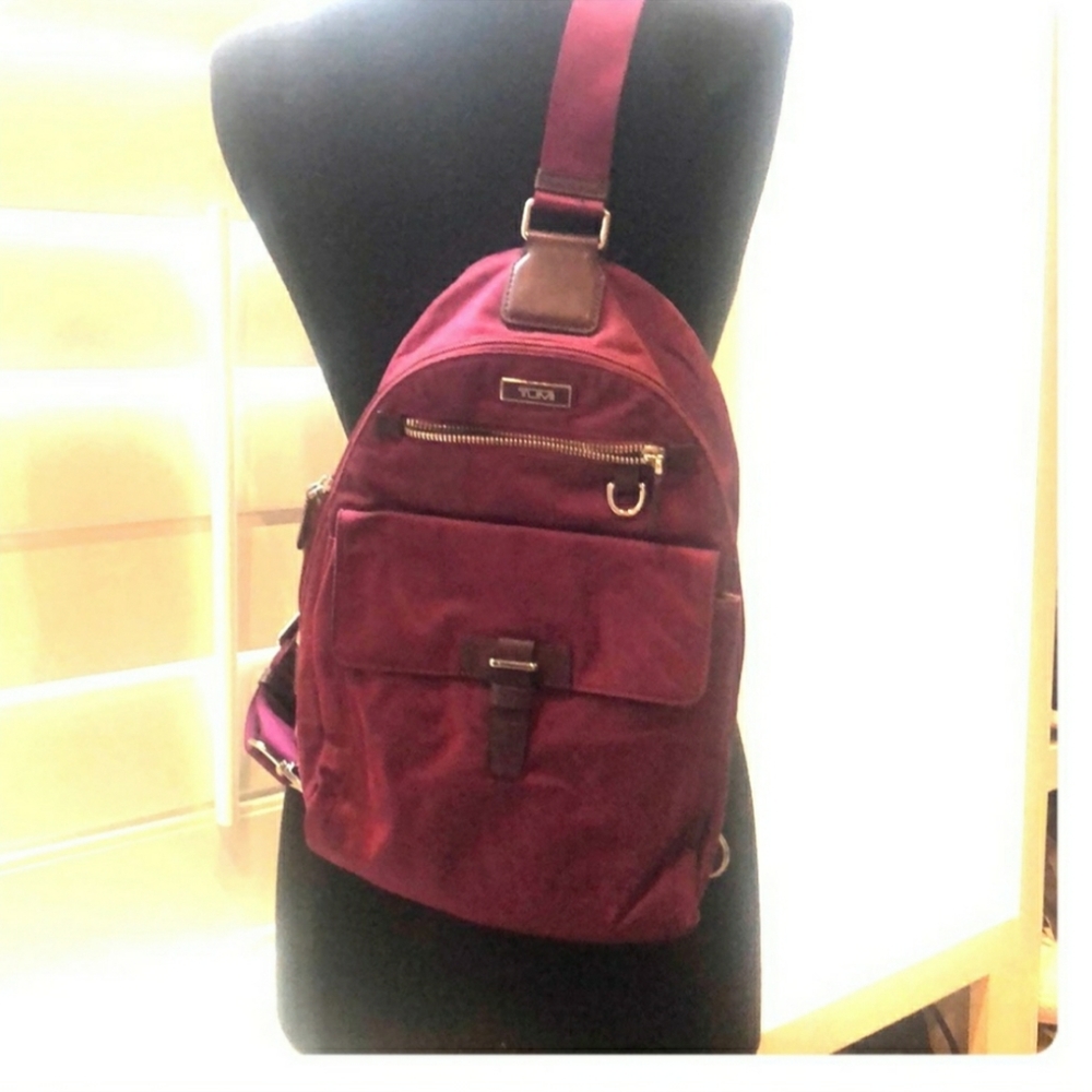Tumi sling bag!